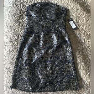 Brand new. With tags. Never worn. Size 10. Monique Lhuillier sequin dress